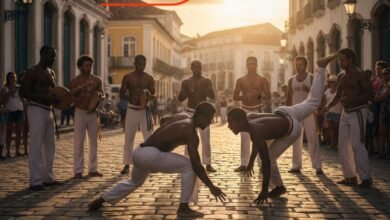 Capoeira movimentos sendo executados em uma roda de capoeira ao ar livre ao pôr do sol